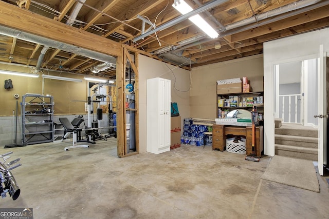 unfinished basement with stairway