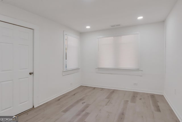 235 Dodd Ave SW, Atlanta, GA 30315 - empty room with light wood-style flooring and recessed lighting