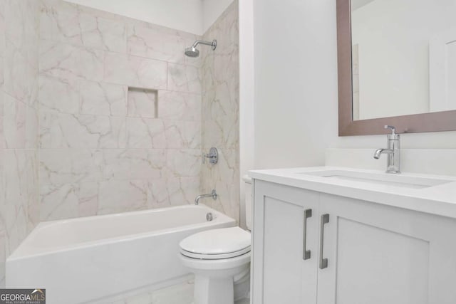 bathroom featuring vanity, toilet, and bathing tub / shower combination