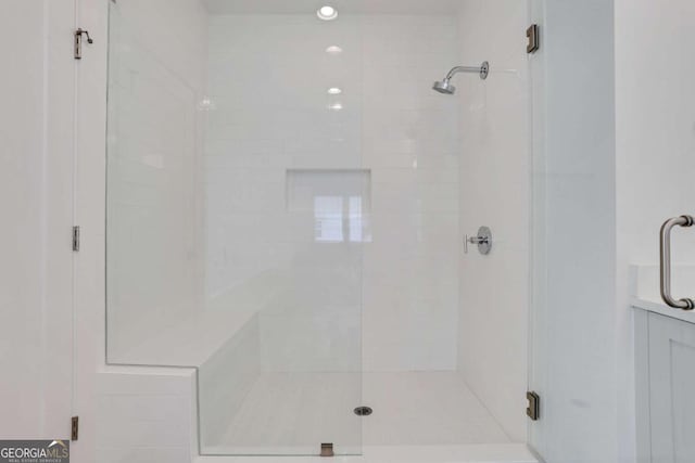 bathroom featuring a stall shower