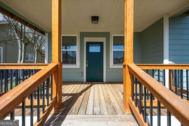 doorway to property with a porch