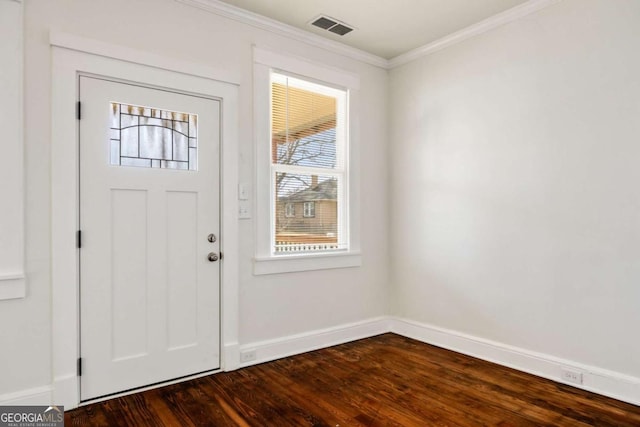 foyer featuring crown molding, baseboards, visible vents, and dark wood-style floors