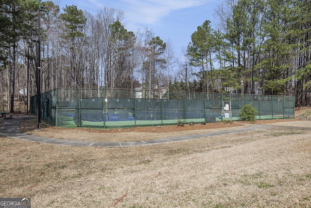 view of sport court with fence