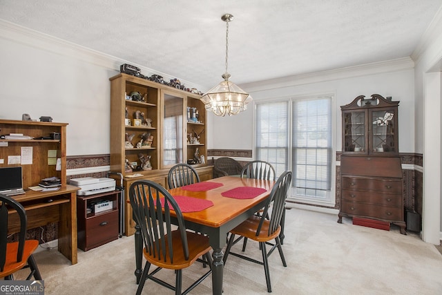 dining area featuring an inviting chandelier, light colored carpet, and a wainscoted wall