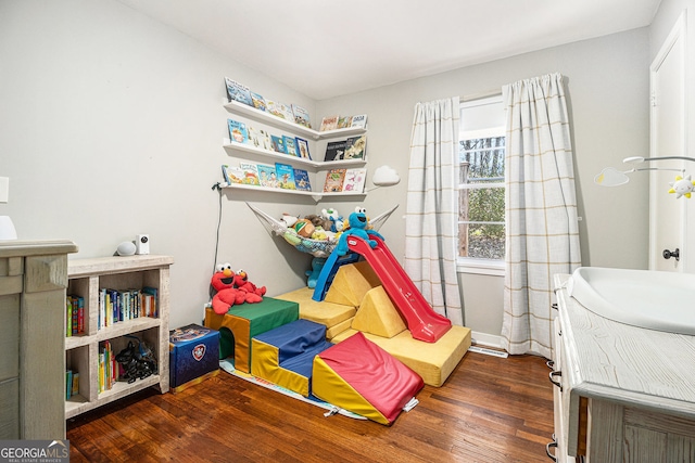 game room featuring wood finished floors