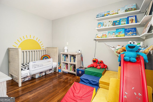 bedroom featuring wood finished floors