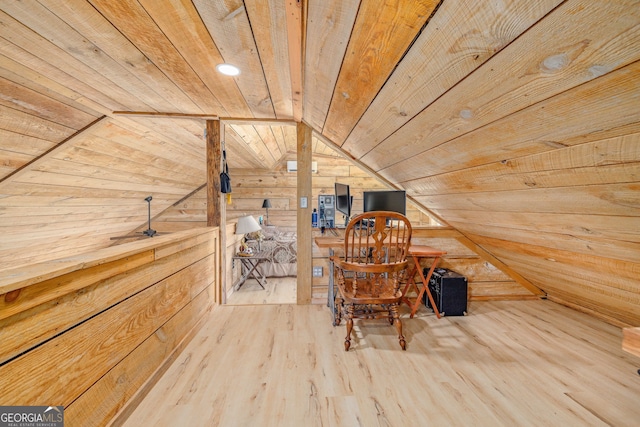 interior space with wood finished floors, wood ceiling, wood walls, and vaulted ceiling