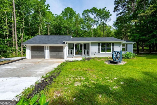 ranch-style home featuring a porch, an attached garage, driveway, and a front yard