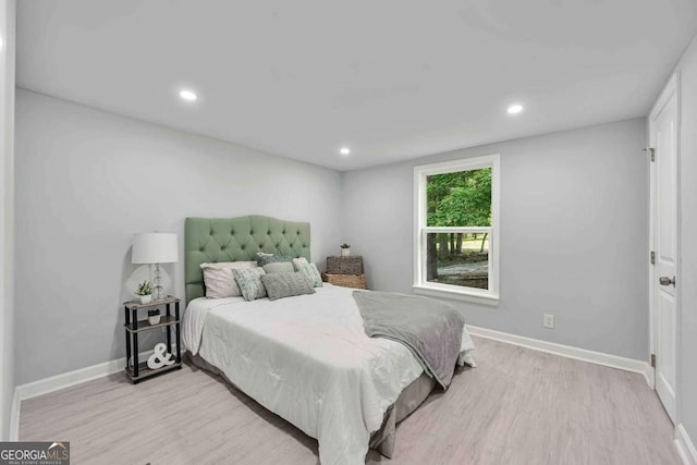 192 Hoke St, Maysville, GA 30558 - bedroom with baseboards, recessed lighting, and light wood-style flooring