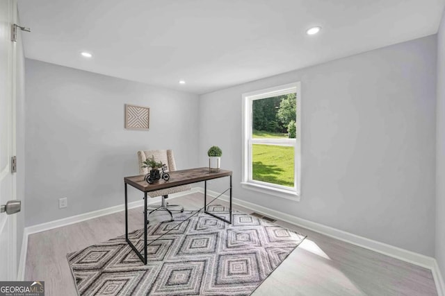 192 Hoke St, Maysville, GA 30558 - home office featuring baseboards, recessed lighting, wood finished floors, and visible vents