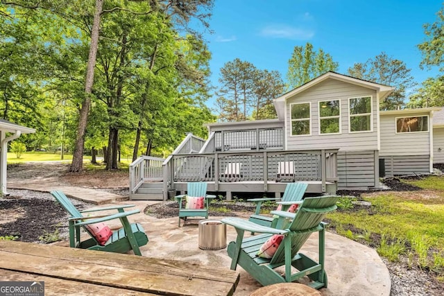 192 Hoke St, Maysville, GA 30558 - rear view of house with a patio and a deck