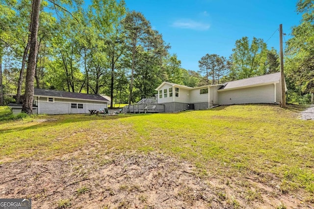 192 Hoke St, Maysville, GA 30558 - rear view of property with a yard