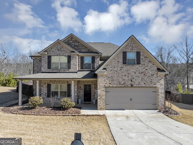 view of front of home with a garage, concrete driveway, a porch, and brick siding