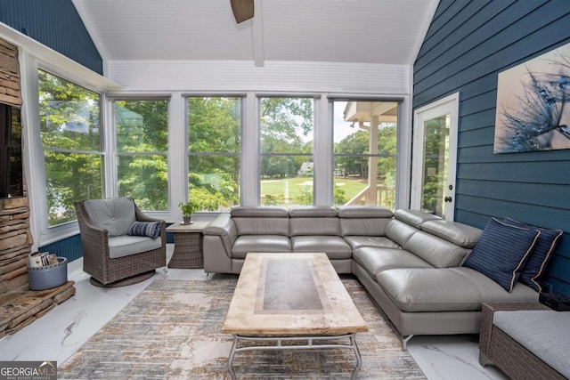 sunroom / solarium with vaulted ceiling