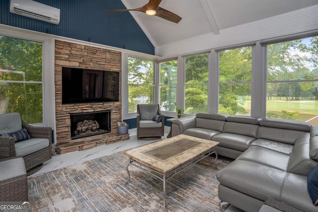 sunroom with a fireplace, a wall mounted AC, ceiling fan, and vaulted ceiling