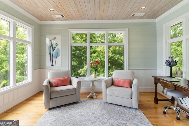 sunroom featuring wood ceiling and visible vents