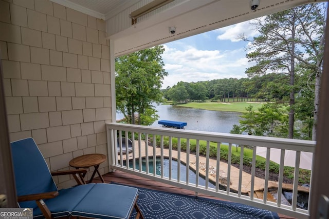 balcony featuring a water view