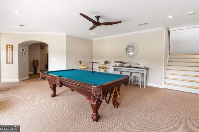 playroom with baseboards, arched walkways, and carpet floors