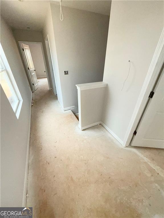 hallway with an upstairs landing