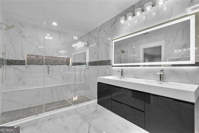 bathroom with visible vents, marble finish floor, a marble finish shower, and a sink