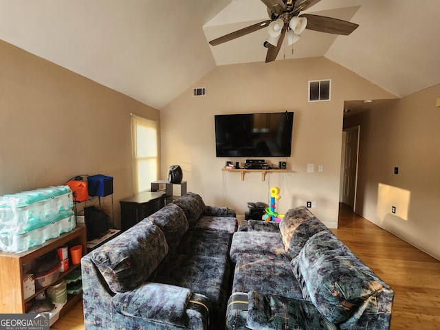6160 Great Oaks Dr, Lithonia, GA 30058 - living room featuring visible vents, lofted ceiling, wood finished floors, and a ceiling fan