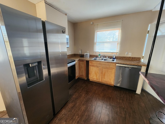 6160 Great Oaks Dr, Lithonia, GA 30058 - kitchen with dark countertops, a sink, appliances with stainless steel finishes, and dark wood-style flooring