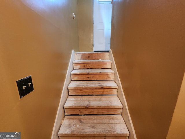 6160 Great Oaks Dr, Lithonia, GA 30058 - stairway with baseboards