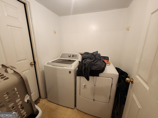 6160 Great Oaks Dr, Lithonia, GA 30058 - washroom featuring washer and dryer and laundry area