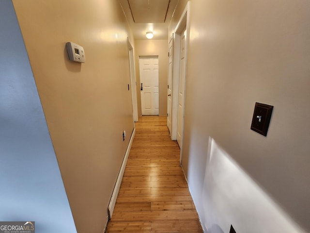 6160 Great Oaks Dr, Lithonia, GA 30058 - corridor with attic access, light wood-style flooring, and baseboards