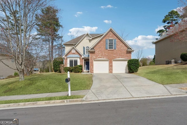 traditional-style home featuring a garage, brick siding, concrete driveway, and a front yard