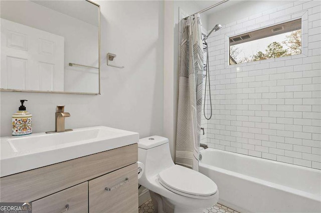 bathroom with vanity, toilet, and shower / tub combo with curtain