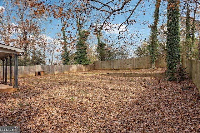 view of yard featuring a fenced backyard
