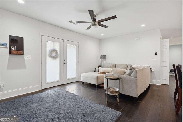 living room with visible vents, baseboards, dark wood finished floors, recessed lighting, and french doors