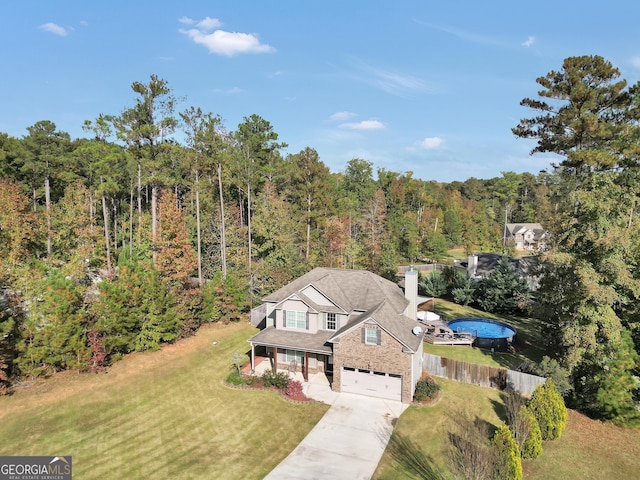 aerial view featuring a forest view