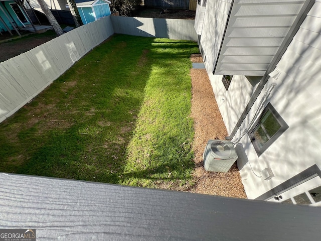 view of yard with a fenced backyard