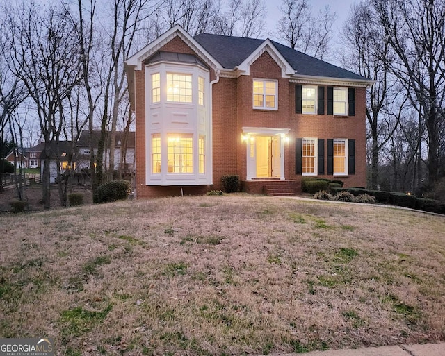 view of front of property with brick siding