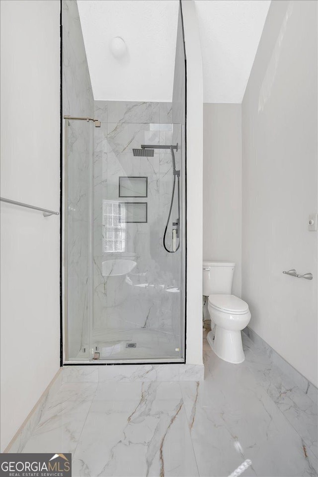 bathroom with a marble finish shower, toilet, and marble finish floor