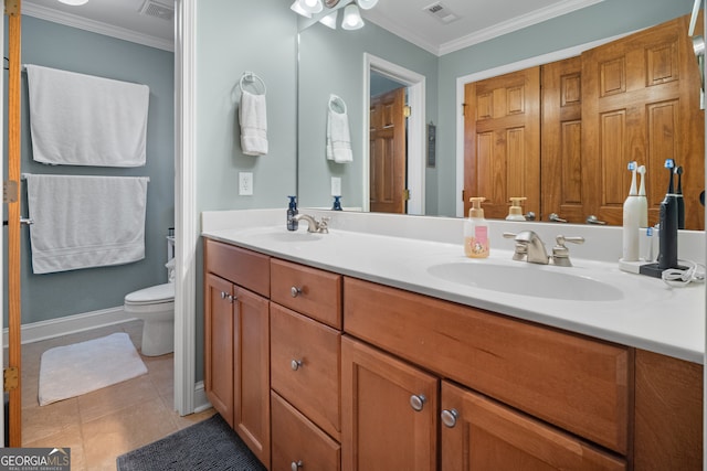 bathroom with toilet, visible vents, and a sink