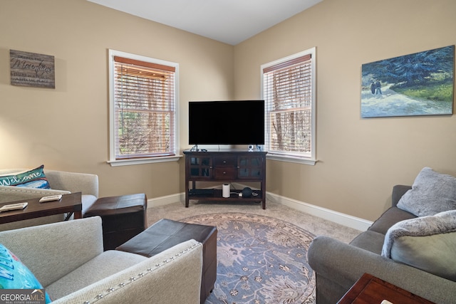 living room with carpet flooring and baseboards