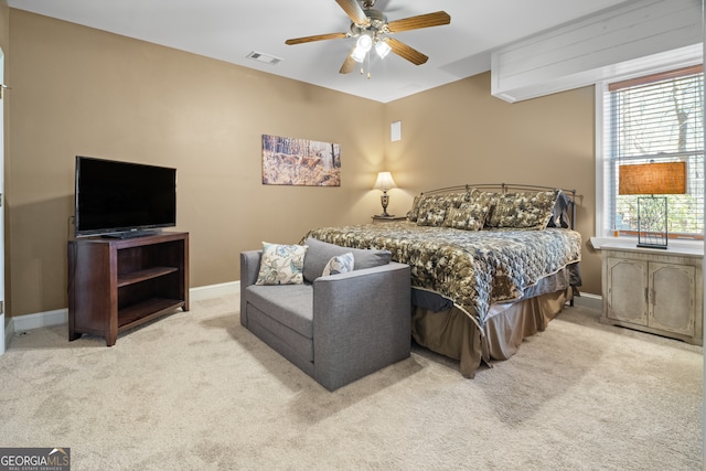 bedroom with carpet flooring, baseboards, and visible vents