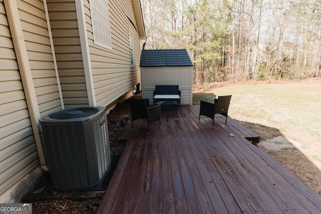 31 Wyngate Ct, Dallas, GA 30157 - wooden terrace featuring cooling unit, an outbuilding, and a storage unit