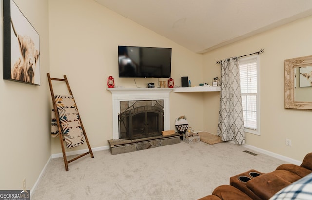 31 Wyngate Ct, Dallas, GA 30157 - carpeted living room with baseboards, a fireplace, visible vents, and vaulted ceiling