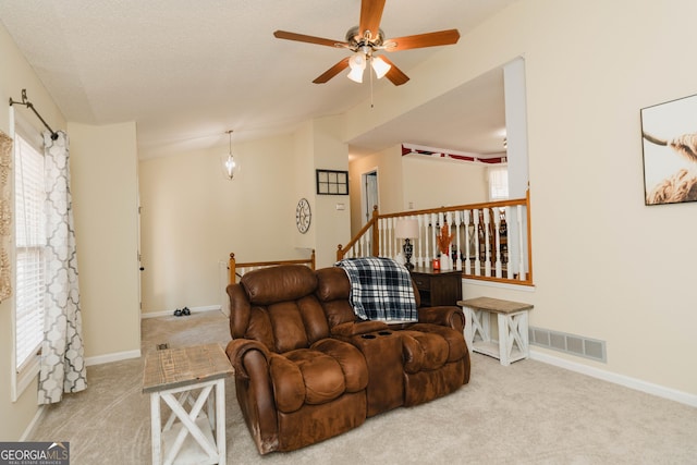 31 Wyngate Ct, Dallas, GA 30157 - carpeted living room with baseboards, lofted ceiling, visible vents, and a ceiling fan
