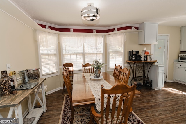31 Wyngate Ct, Dallas, GA 30157 - dining area featuring dark wood-type flooring, a healthy amount of sunlight, and baseboards