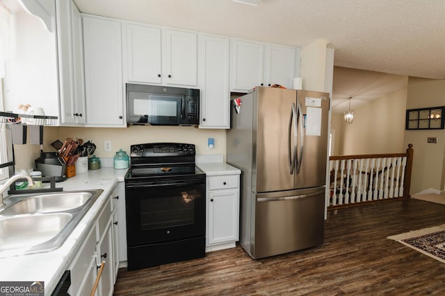 31 Wyngate Ct, Dallas, GA 30157 - kitchen featuring dark wood finished floors, black appliances, a sink, and white cabinets