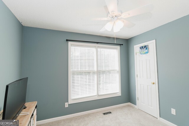 31 Wyngate Ct, Dallas, GA 30157 - unfurnished bedroom with baseboards, carpet floors, ceiling fan, and visible vents