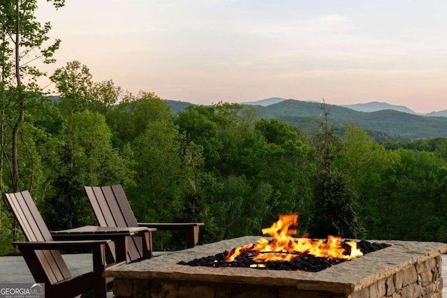 view of mountain feature featuring a forest view