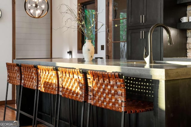 896 Locust Ln, Morganton, GA 30560 - bar featuring a bar, a sink, and a chandelier