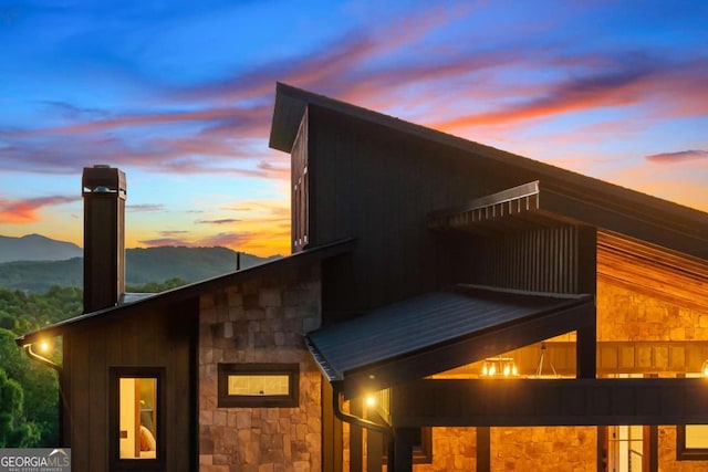 view of home's exterior featuring stone siding