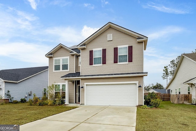 traditional-style house with a garage, concrete driveway, a front lawn, and fence